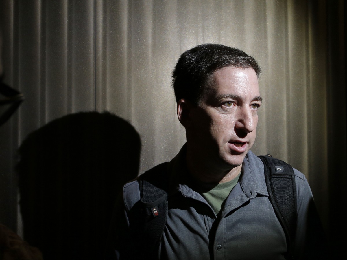 Glenn Greenwald, a reporter of The Guardian, speaks to reporters at his hotel in Hong Kong Monday, June 10, 2013. (AP/Vincent Yu)