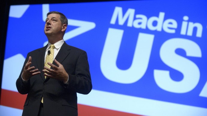 Wal-Mart U.S. President and CEO Bill Simon addresses attendees of the Wal-Mart U.S. Manufacturing Summit in Orlando, Fla., Thursday, Aug. 22, 2013. (AP Photo/Phelan M. Ebenhack)