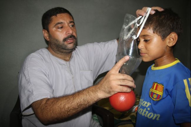 In Blockaded Gaza, Making Gas Masks With Jars, Paper Towels