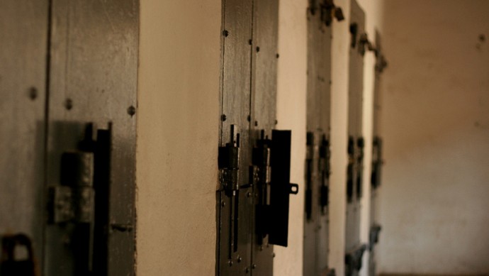 Looking down the wall in the Solitary Confinement area in Boise, Idaho. The only light in the rooms come through a little window in the door and a small pipe for ventilation in the ceiling. (Photo by DieselDemon via Flikr)