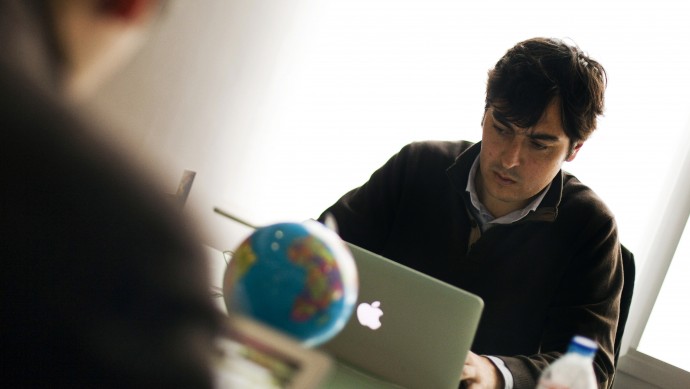n this Thursday, Feb. 28, 2013 photo, Spanish Minube's CEO-Founder Raul Jimenez Algobia, right, and an employee work on their computers in Madrid. Minube is an innovative company that offers travel experiences from users around the world in multiple languages on its Internet site and smartphone applications. Spain's crushing five-year economic crisis that has produced 26 percent unemployment is forcing ingenuity, innovation and creativity into the workforce of a country where new entries into the job market typically sought stable long-term employment with established companies or low-tech family-owned businesses. (AP Photo/Andres Kudacki)