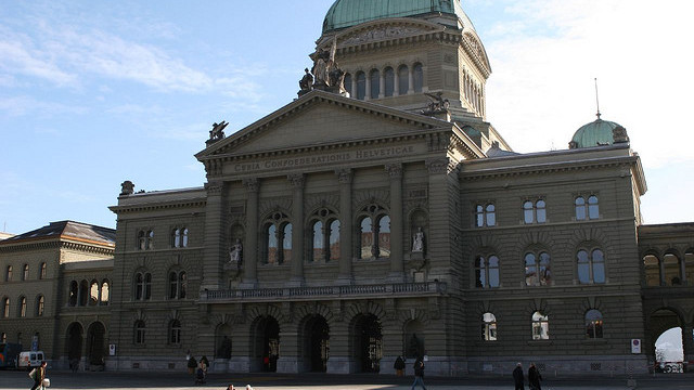 The Swiss Parliament building in Berne, Switzerland. In a symbolic gesture, Swiss activists dumped a truckload of 8 million five-cent coins outside of the building Friday, Oct. 4 2013. (Photo/eastside06 via Flicker)