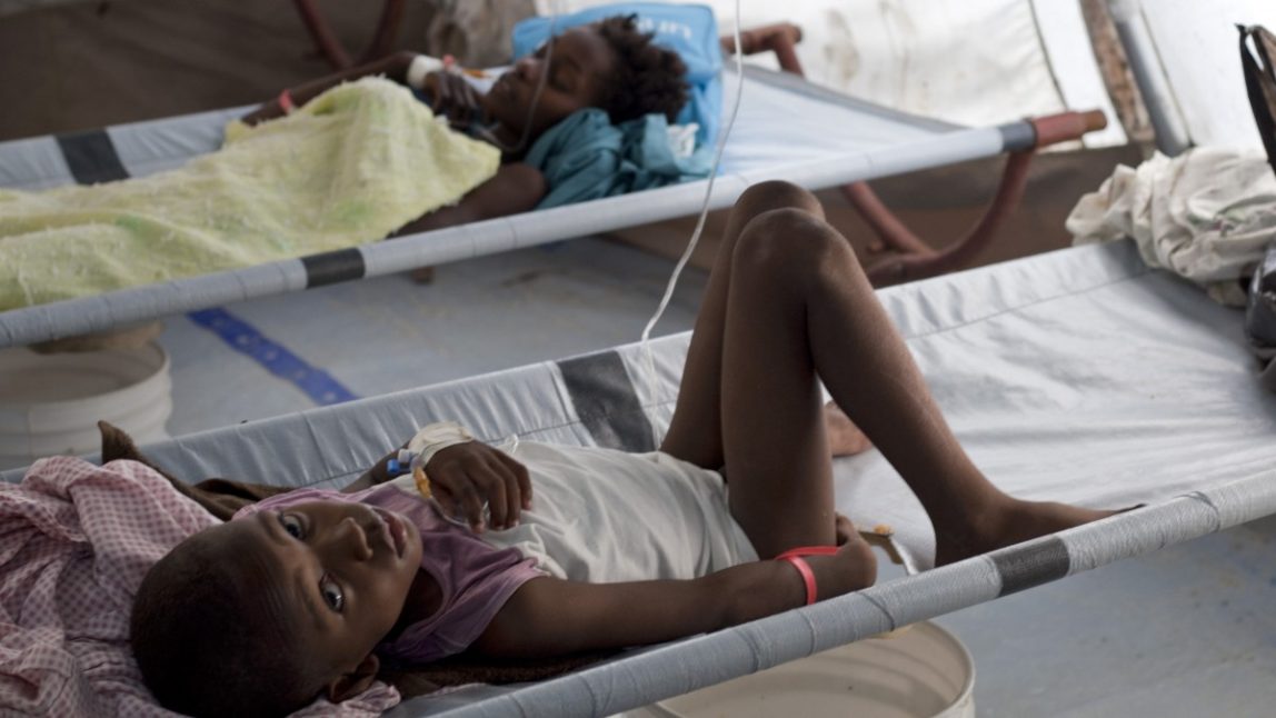 Children suffering cholera symptoms lie on cots as they receive serum at a hospital run by the relief organization Doctors Without Borders in Port-au-Prince, Haiti, Wednesday, Nov. 28, 2012. (AP Photo/Dieu Nalio Chery)