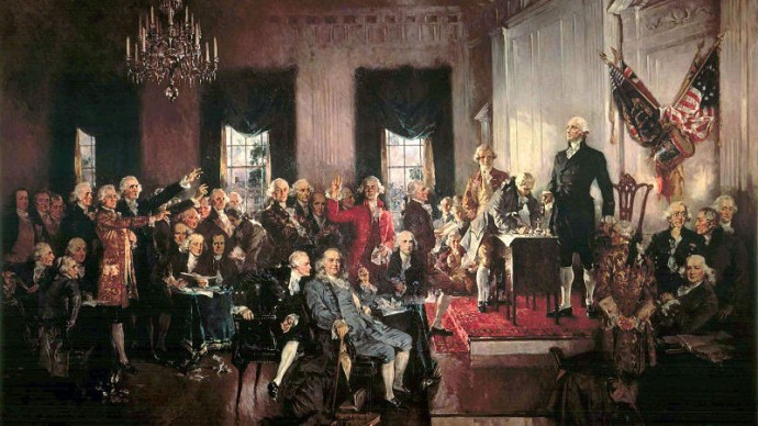 The "Scene at the Signing of the Constitution of the United States" by American painter Howard Chandler Christy (1873–1952). (Photo via Wikimedia Commons)