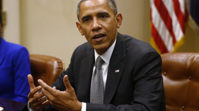 President Barack Obama meets with small business owners about the government shutdown and debt ceiling, Friday, Oct. 11, 2013, in the Roosevelt Room of the White House in Washington. (AP Photo/Charles Dharapak)