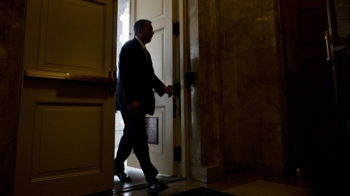 House Speaker John Boehner of Ohio arrives on Capitol Hill in Washington, Friday, Oct. 11, 2013. President Barack Obama and Republicans in the House of Representatives are exploring whether they can end a budget standoff that has triggered a partial government shutdown and put Washington on the verge of an economy-jarring federal default. (AP Photo/ Evan Vucci)