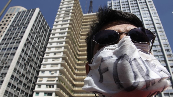 A student takes part in a protest against the high level of unemployment in Sao Paulo, Friday, Aug. 14 , 2009. Protesters also claimed for a land reform. (AP Photo/Andre Penner)