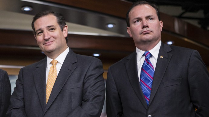 Sen. Ted Cruz, R-Texas, left, and Sen. Mike Lee, R-Utah, during a news conference with conservative Congressional Republicans at the Capitol in Washington, Thursday, Sept. 19, 2013.  Cruz and Lee stand as the Senate’s dynamic duo for conservatives, crusading against President Barack Obama’s health care law while infuriating many congressional Republicans with a tactic they consider futile, self-serving and detrimental to the party’s political hopes in 2014. (AP Photo/J. Scott Applewhite)