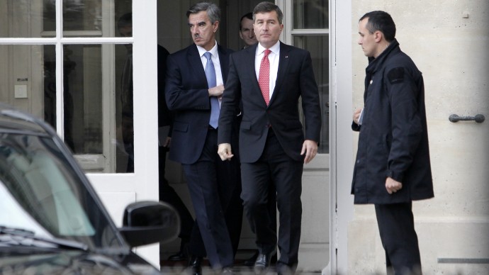 U.S Ambassador to France Charles H. Rivkin, right, leaves the Foreign Ministry in Paris, after he was summoned Monday, Oct. 21, 2013. The French government had summoned the ambassador to explain why the Americans spied on one of their closest allies. Le Monde newspaper said Monday, Oct. 21, 2013 that documents leaked by Edward Snowden show that the U.S. National Security Agency swept up 70.3 million French phone records in a 30-day period. (AP Photo/Thibault Camus)