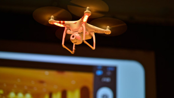 Phantom, a drone designed to take photographs from the air, is demonstrated at the Drones and Aerial Robotics Conference (DARC), held at New York University, on Oct. 12, 2013. (Kike Calvo via AP Images)