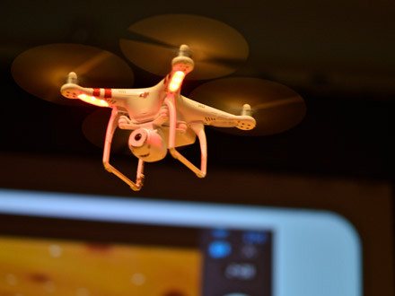 Phantom, a drone designed to take photographs from the air, is demonstrated at the Drones and Aerial Robotics Conference (DARC), held at New York University, on Oct. 12, 2013. (Kike Calvo via AP Images)