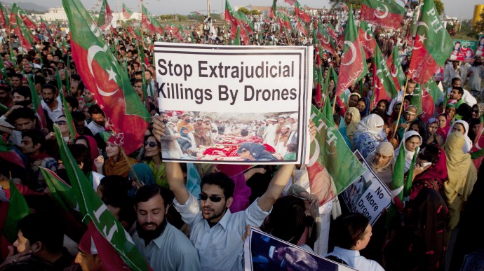 Supporters of Pakistani cricketer-turned-politician Imran Khan rally to condemn U. S. drone attacks in Pakistani tribal areas on al-Qaida and Taliban hideouts, in Islamabad, Pakistan, Friday, Oct 28, 2011. The U.S. refuses to acknowledge the CIA-run drone program in Pakistan publicly, but officials have said privately that the drone strikes have killed many senior al-Qaida and Taliban commanders. (AP Photo/B.K.Bangash)