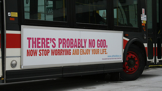 A Canadian bus with a sign reading "There's probably no God, no stop worrying and enjoy your life" on the side, in light of Atheism. (Photo/Athiest Bus Canada via Flickr)