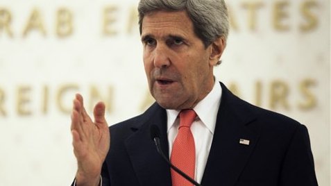U.S. Secretary of State John Kerry talks with a journalist during a press conference.  (AP/Kamran Jebreili)
