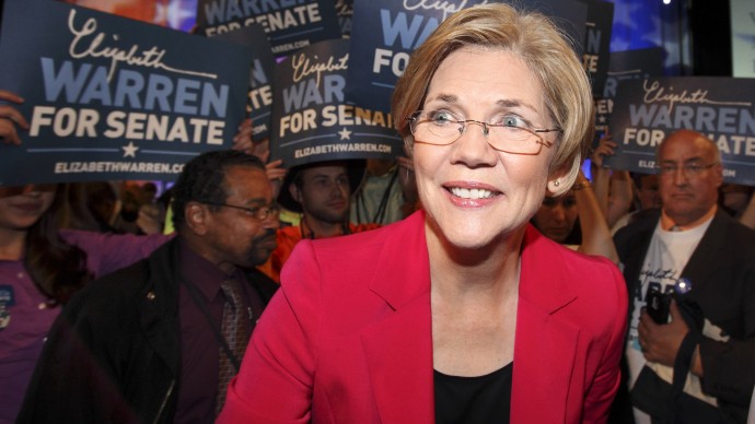 Elizabeth Warren walks through a crowd of supporters after winning the delegate vote to become the Democratic U.S. Senate candidate at the Democratic State Convention in Springfield, Mass. on Saturday, June 2, 2012. (AP Photo/Michael Dwyer)