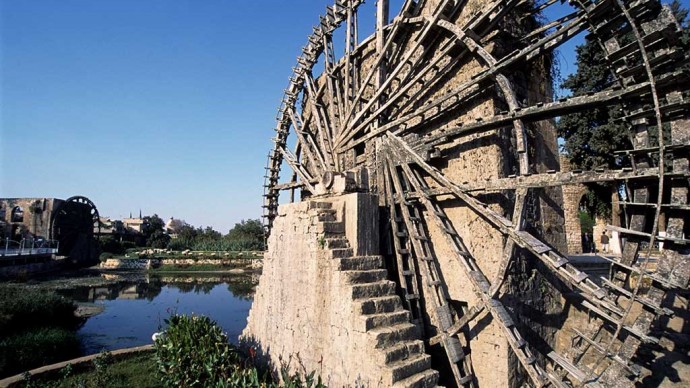 A giant 20 meter high water wheel used for centuries to divert water from the  Orontes River to the city of Hama. Photo Norbert Schiller