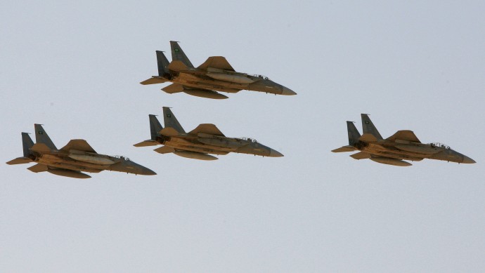FILE - In this Sunday, Jan. 25, 2009 file photo, F-15 warplanes of the Saudi Air Force fly over the Saudi Arabian capital Riyadh during a graduation ceremony at King Faisal Air Force University. The Obama administration is expected to notify Congress on Wednesday, Oct. 20, 2010 of a multibillion-dollar sale of fighter jets and military helicopters to Saudi Arabia, including as many as 84 new F-15 fighter jets and three types of helicopters, officials said Tuesday, Oct. 19, 2010. (AP Photo/Hassan Ammar, File)