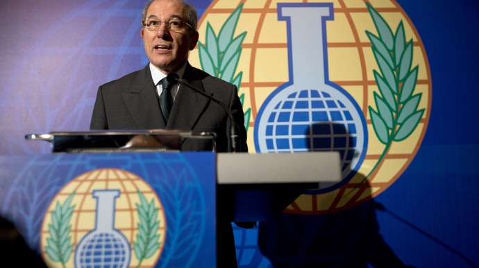 FILE - This is a Friday Oct. 11, 2013.  file photo of Director General of  the Organization for the Prohibition of Chemical Weapons  Ahmet Uzumcu as  comments on the organization being awarded the Nobel Peace Prize, during a press conference in The Hague, Netherlands. The Organization for the Prohibition of Chemical Weapons is posting a request for “expressions of interest” from companies who want a role in “the treatment and disposal of hazardous and non-hazardous organic and inorganic chemicals.” The agency, which won the Nobel Peace Prize this year, has been directed by the United Nations to oversee the destruction of the Syrian government’s chemical weapons. The unprecedented disarmament in the midst of a civil war now in its third year was launched following an Aug. 21 chemical weapons attack on a Damascus suburb that killed hundreds of civilians.  (AP Photo/Peter Dejong, File)