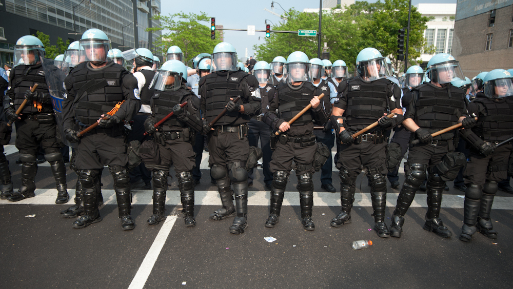 Police break up demonstrators at the end of their march through the streets of Chicago to protest the NATO Summit taking place in the city on May 20, 2012. 