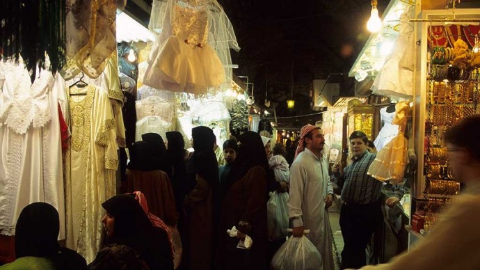 The covered bazaar in Aleppo, said to be the largest indoor Souk in the world, during happier times. (photo Norbert Schiller)