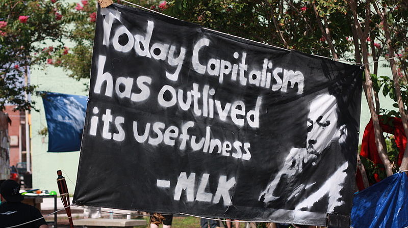 Banner at the 2012 Republican National Convention depicts Martin Luther King, Jr., and the quotation: "Today Capitalism has outlived its usefulness," in this August 28, 2012 photo. (Photo/Liz MC via Wikimedia Commons)