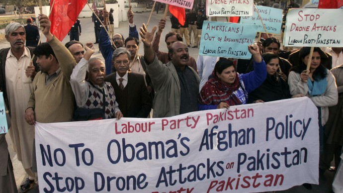 Supporters of Pakistani Labour Party rally against United States and condemned drone attacks on militants in Pakistani tribal areas along the Afghanistan border, Friday, Dec. 4, 2009 in Lahore, Pakistan. (AP Photo/K.M.Chaudary)