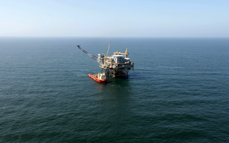 A view of an oil rig in  the Gulf of Mexico, 50 miles off the cost of Louisiana, on Sunday, April 10, 2011. (AP Photo/Gerald Herbert)