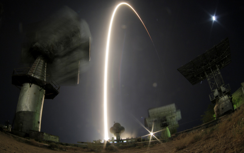 In this photo taken with a fisheye lens and with long time exposure the Soyuz-FG rocket booster with Soyuz TMA-10M space ship carrying a new crew to the International Space Station. (AP Photo/Dmitry Lovetsky)In this photo taken with a fisheye lens and with long time exposure the Soyuz-FG rocket booster with Soyuz TMA-10M space ship carrying a new crew to the International Space Station. (AP Photo/Dmitry Lovetsky)
