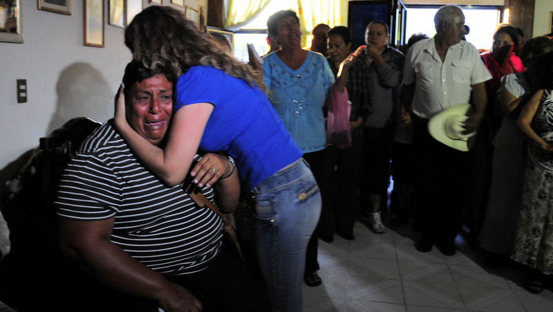 Edelmira Arias is comforted while weeping at the home of the parents of Texas death-row inmate Edgar Tamayo, her cousin, in Miacatlan, Mexico, Wednesday, Jan. 22, 2014. The U.S. Supreme Court rejected appeals Wednesday night for Mexican national Edgar Tamayo, clearing the way for the Texas death row inmate to be executed for the slaying of a Houston police officer 20 years ago. Secretary of State John Kerry previously asked Texas to delay Tamayo's punishment, saying it "could impact the way American citizens are treated in other countries." The State Department repeated that stance Wednesday. (AP Photo/Tony Rivera)
