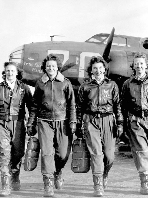 These four female pilots leaving their ship at the four engine school at Lockbourne are members of a group of WASPS who have been trained to ferry the B-17 Flying Fortresses. (U.S. Air Force photo)