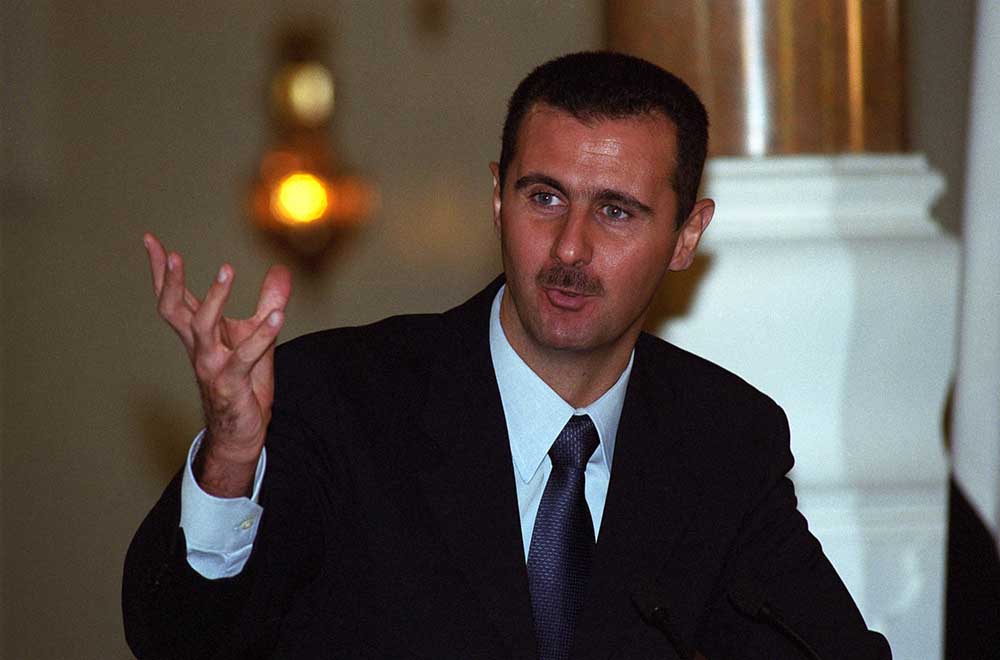 A young 35 year old Bashar al Assad takes over the helm after his father hafez al Assad dies in June 2000. Photo Norbert Schiller)