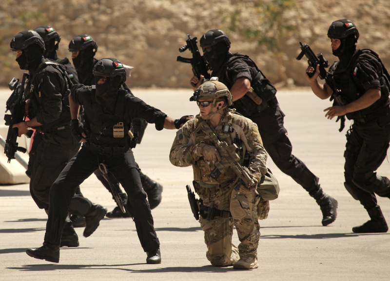 FILE - In this Thursday, June 20, 2013 photo, special operations forces from Iraq, Jordan and the U.S. conduct an exercise as part of Eager Lion multinational military maneuvers at the King Abdullah Special Operations Training Center (KASOTC) in Amman, Jordan. (AP Photo/Maya Alleruzzo, File)