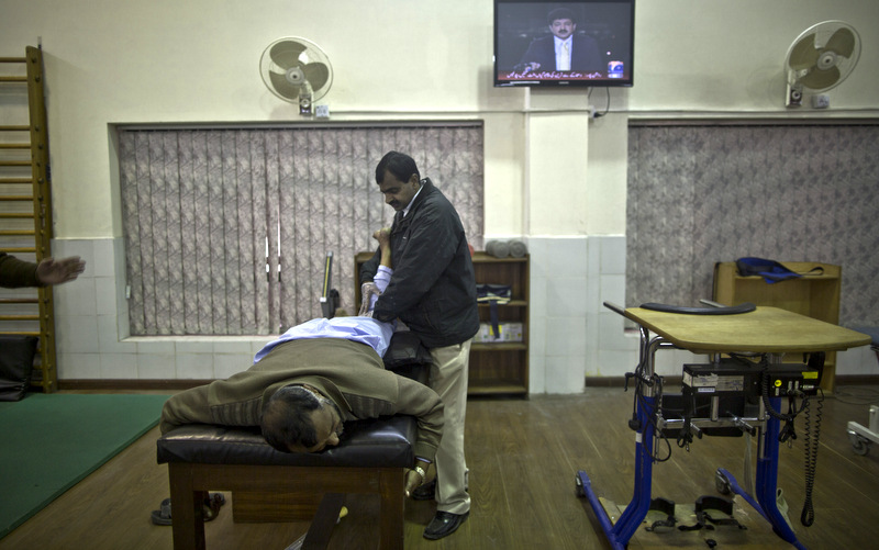A patient at the Armed Forces Institute for Rehabilitation Medicine, receives a phsyotherapy session,  in Rawalpindi, Pakistan. (AP Photo/Muhammed Muheisen)