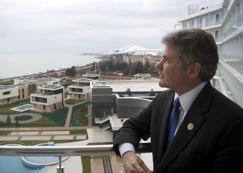U.S. Congressman, Rep. Michael McCaul, Chairman of the House Homeland Security Committee, stands of a balcony of his hotel which overlooks the Olympic Park, in the Black Sea resort of Sochi, Tuesday, Jan. 21, 2014. Michael McCaul who was in Sochi on Tuesday to assess the situation said he was impressed by the work of Russian security forces but troubled that potential suicide bombers had gotten into the city despite all of the extraordinary security measures. (AP Photo/Nataliya Vasilyeva)