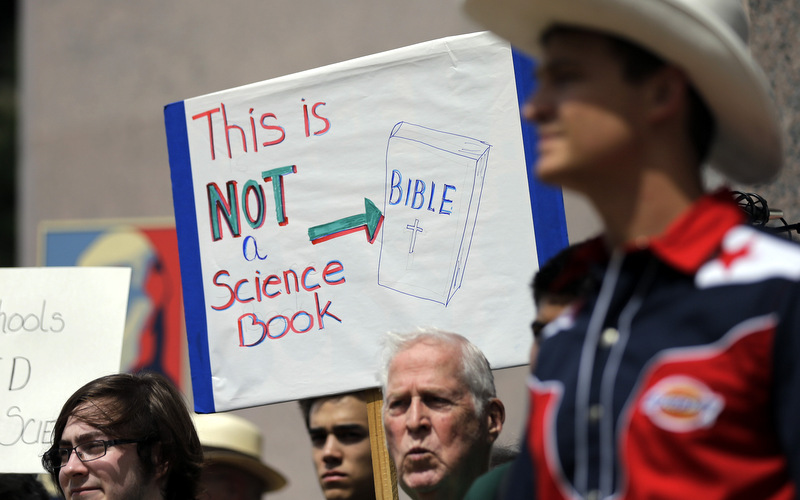 Pro-science supporters rally prior to a State Board of Education public hearing on proposed new science textbooks, in Austin, Texas. (AP Photo/Eric Gay, File)