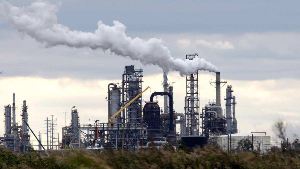 Total Petrochemicals Port Arhtur refinery is shown Wednesday, Dec. 2, 2009 in Port Arthur, Texas. Over the past several years, Total Petrochemical's sprawling oil refinery in southeast Texas has sprayed tons of sulfuric acid and carbon monoxide into the sky. (AP Photo/David J. Phillip)