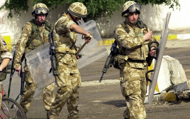 British troops in action in Iraq in 2004. Britain’s highest court says the families of several soldiers killed or injured in Iraq can sue the government for failing to protect them. Photo: AP