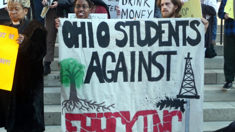 Protesters hold a sign denouncing fracking in Ohio at a rally in 2006.