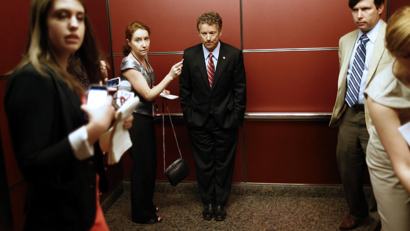 Sen. Rand Paul, R-Ky. rides in an elevator with reporters and staff members after he spoke at the Faith and Freedom Coalition Road to Majority Conference in Washington, Thursday, June 13, 2013. (AP/Charles Dharapak)