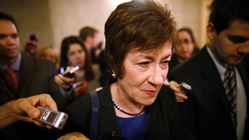 Sen. Susan Collins, R-Maine, is followed by reporters as she leaves a meeting of Senate Republicans. Oct. 12, 2013. (AP Photo/Charles Dharapak)