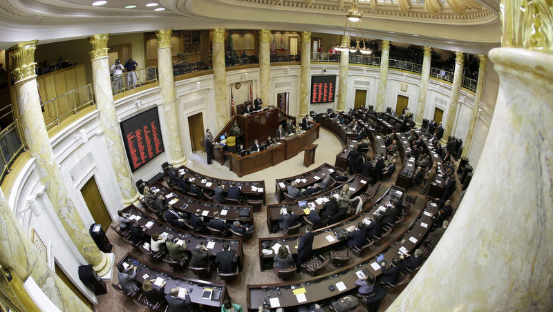 egislators gather in the House chamber for the opening of the 2014 Fiscal session at the Arkansas state Capitol in Little Rock, Ark
