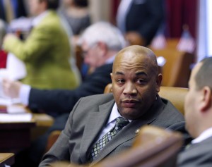 Assemblyman Carl Heastie, D-Bronx, a sponsor to raise the state's minimum wage, works in the Assembly Chamber at the state Capitol on Wednesday, Jan. 22, 2014, in Albany, N.Y.  Minimum wage proposals are getting a maximum push from Democrats in statehouses around the nation this year. (AP Photo/Mike Groll)