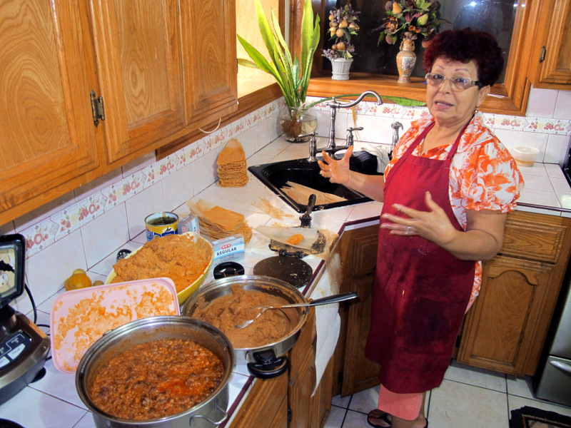 Hilda Vasquez makes tamales in her kitchen in Edinburg, Texas on Wednesday, Dec. 4, 2013.Vasquez raised the $680 for her U.S. citizenship application by selling batches of homemade tamales at South Texas offices. Immigration advocates are concerned comprehensive immigration reform proposals, which could more than triple the cost of legalization and citizenship for those illegally in the country, will make the financial hurdles almost impassable. (AP Photo/Christopher Sherman)