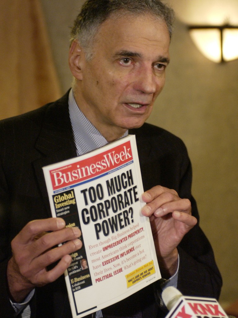 Presidential candidate Ralph Nader holds up a "Business Week" cover to emphasize a point during a news conference at the Crowne Plaza Hotel in Los Angeles, Friday, July 30, 2004. (AP Photo/Chris Pizzello)