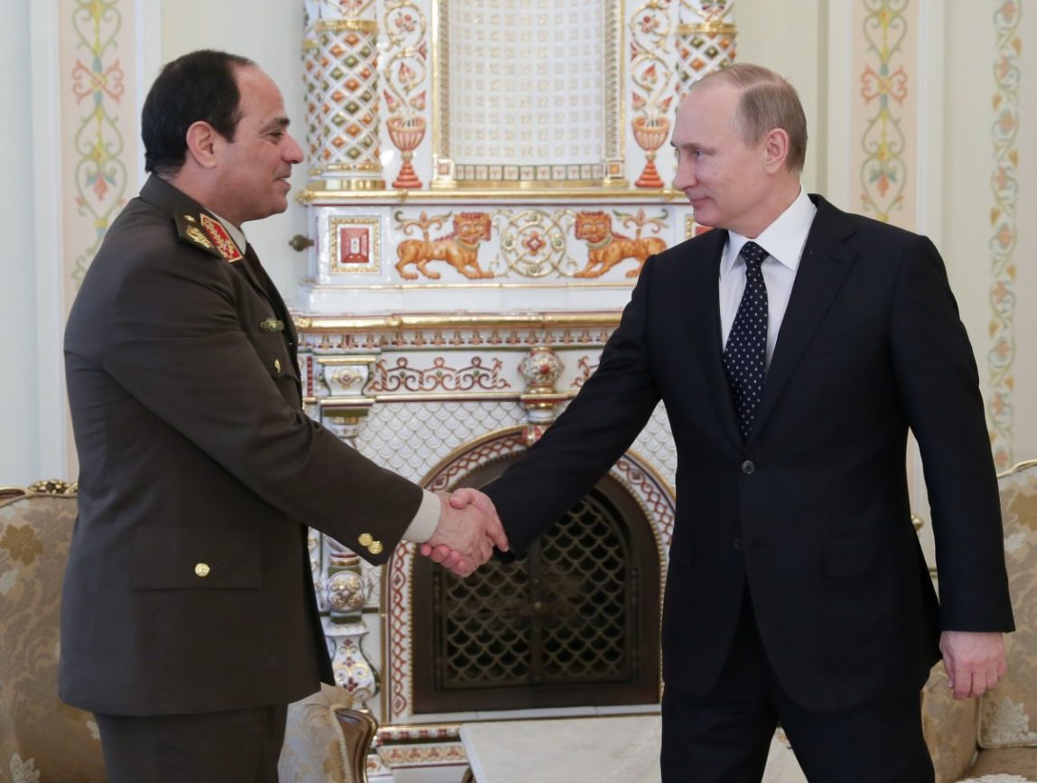 Russian President Vladimir Putin, right, shakes hands with Egypt's Military chief Field Marshal Abdel-Fattah el-Sissi in the Novo-Ogaryovo residence outside Moscow on Thursday, Feb. 13, 2014. Russian President Vladimir Putin on Thursday wished Egypt's military chief victory in the nation's presidential vote as Moscow sought to expand its military and other ties with a key U.S. ally in the Middle East. (AP Photo/RIA Novosti, Mikhail Metzel, Presidential Press Service)