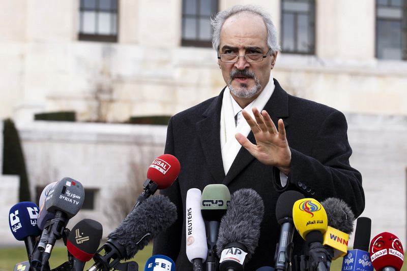 Syrian chief negotiator Bashar al-Jaafari, Ambassador of the Permanent Representative Mission of the Syria to UN New York, speaks to the media during a new press conference after closing the second round of negotiation between the Syrian government and the opposition at the European headquarters of the United Nations, in Geneva, Switzerland, Saturday , February 15, 2014. (KEYSTONE/Salvatore Di Nolfi)