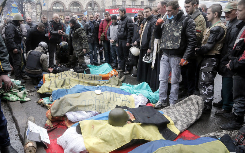 Activists pay respect to dead protesters