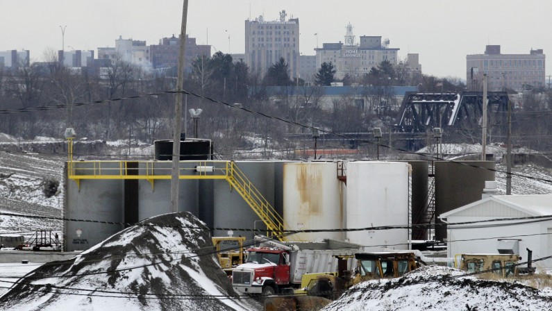 With the skyline of Youngstown, Ohio in the distance, a brine injection well owned by Northstar Disposal Services LLC is seen in Youngstown on Wednesday, Jan. 4, 2011. The company has halted operations at the well, which disposes of brine used in gas and oil drilling, after a series of small earthquakes hit the Youngstown area. In Ohio, geographically and politically positioned to become a leading importer of wastewater from gas drilling, environmentalists and lawmakers opposed to the technique known as fracking are seizing on this series of small earthquakes as a signal to proceed with caution. (AP Photo/Amy Sancetta)