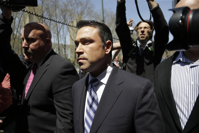U.S. Rep. Michael Grimm leaves federal court in New York, Monday, April 28, 2014. Grimm was taken into custody Monday to face federal charges following a two-year investigation of his campaign financing. (AP Photo/Seth Wenig)