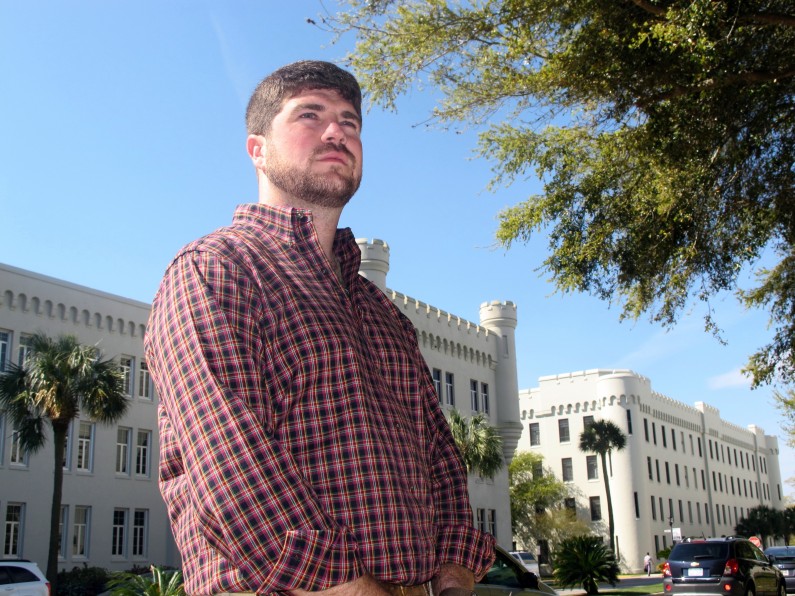 Andrew Kispert, a 27-year-old Marine veteran who is now attending The Citadel, poses on the campus of the military college in Charleston, S.C., on Friday, April 4, 2014. Over the next few years thousands of veterans are expected to attend college as the wars in Iraq and Afghanistan wind down and the military downsizes.  (AP Photo/Bruce Smith)